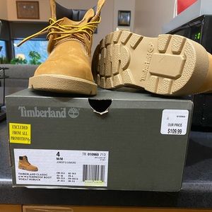 I have a brand new pair of kids Timberlands size 4.